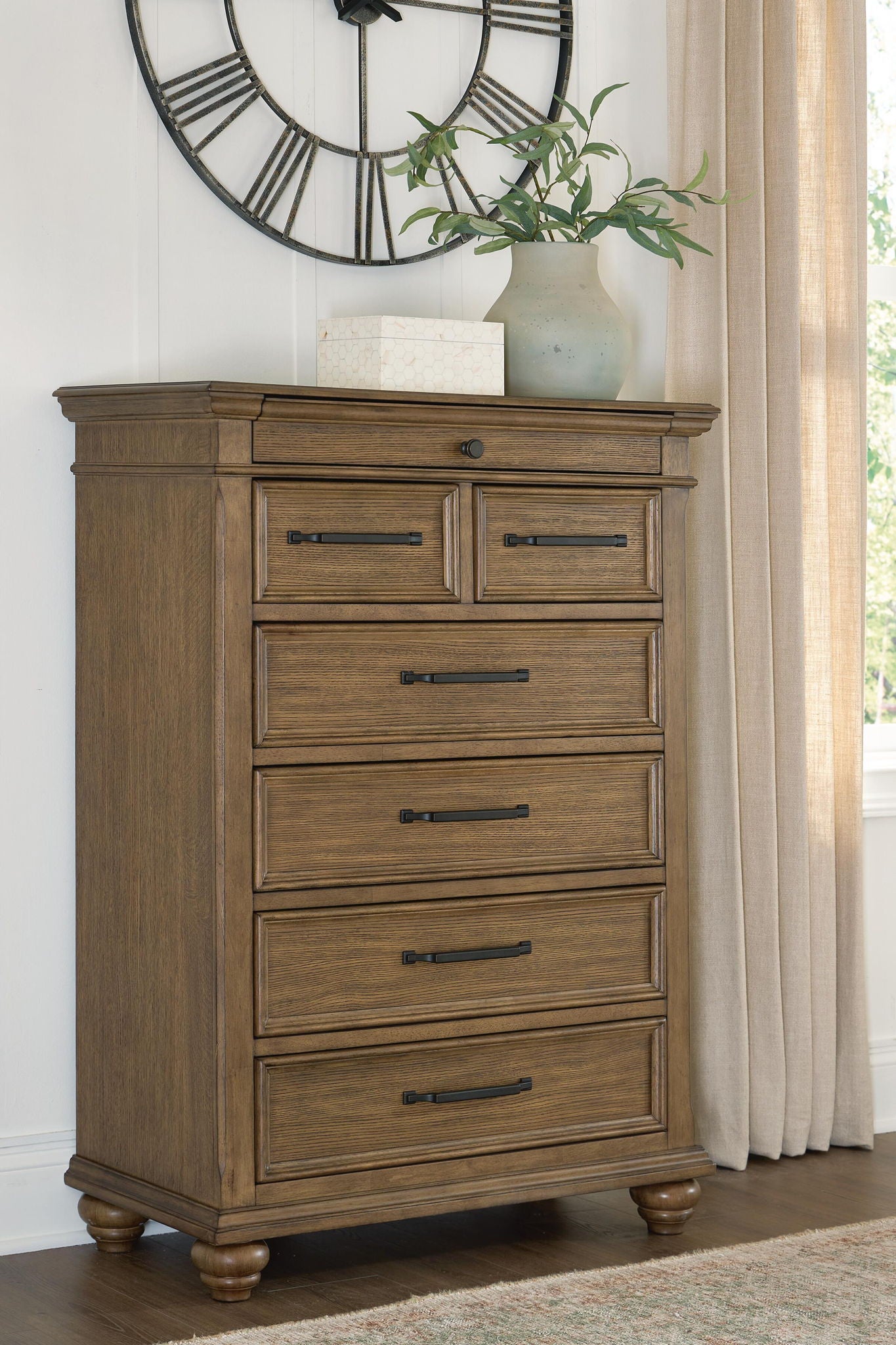 Karallin - Seven Drawer Chest - Medium Brown