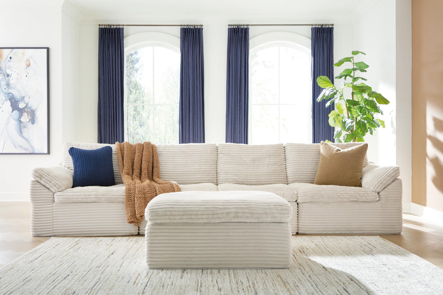 Fannin - 4-Piece Sectional With Ottoman - Ivory